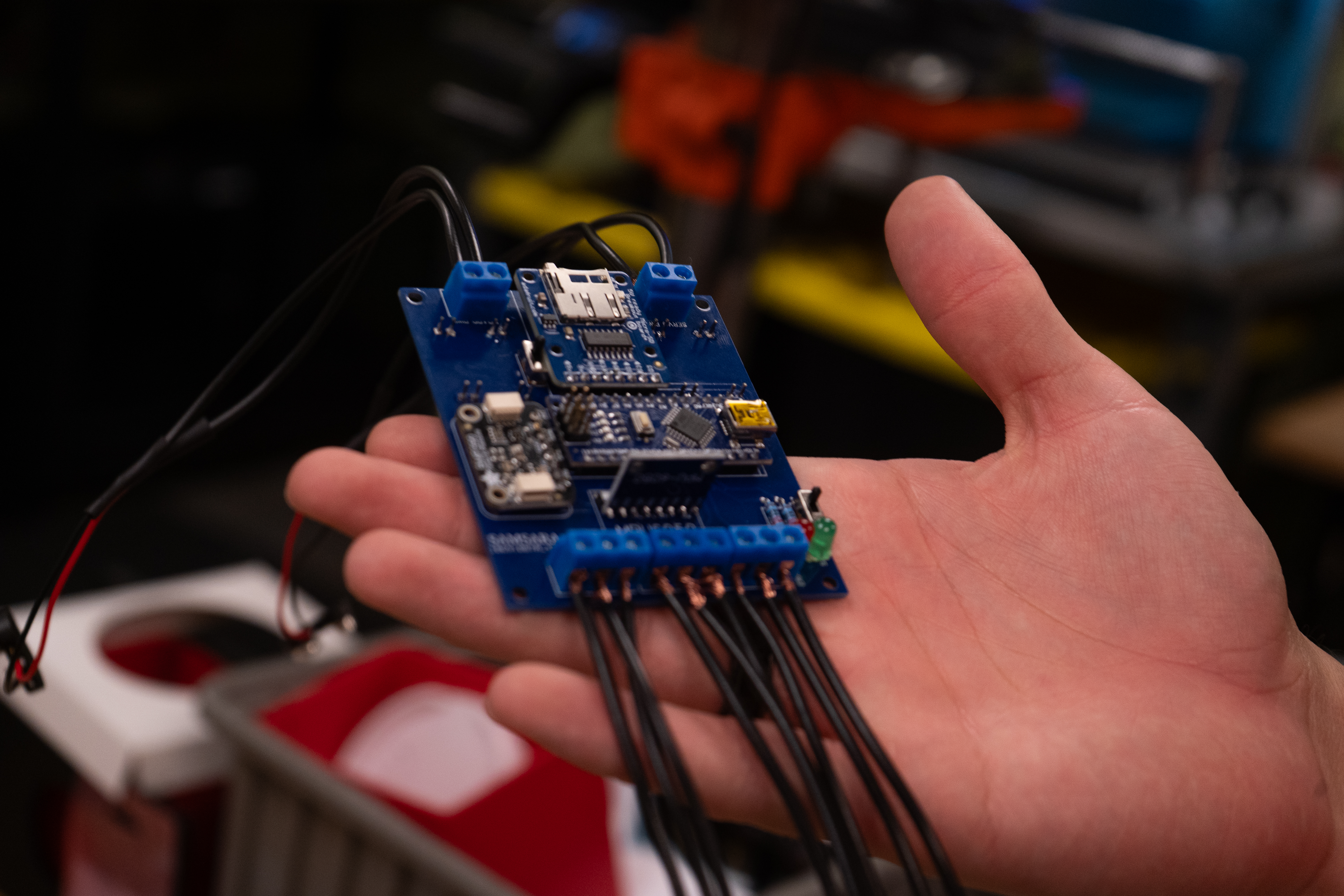 Hand holding the SAMSARA V1.0 board